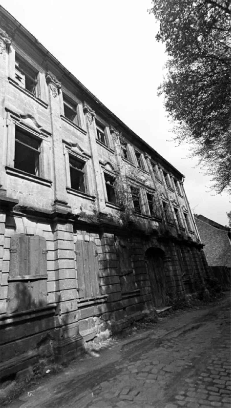 Ruins of the rest of the facade and roof construction of an apartment building am Duesterngraben in Halberstadt in the state Saxony-Anhalt on the territory of the former GDR, German Democratic Republic