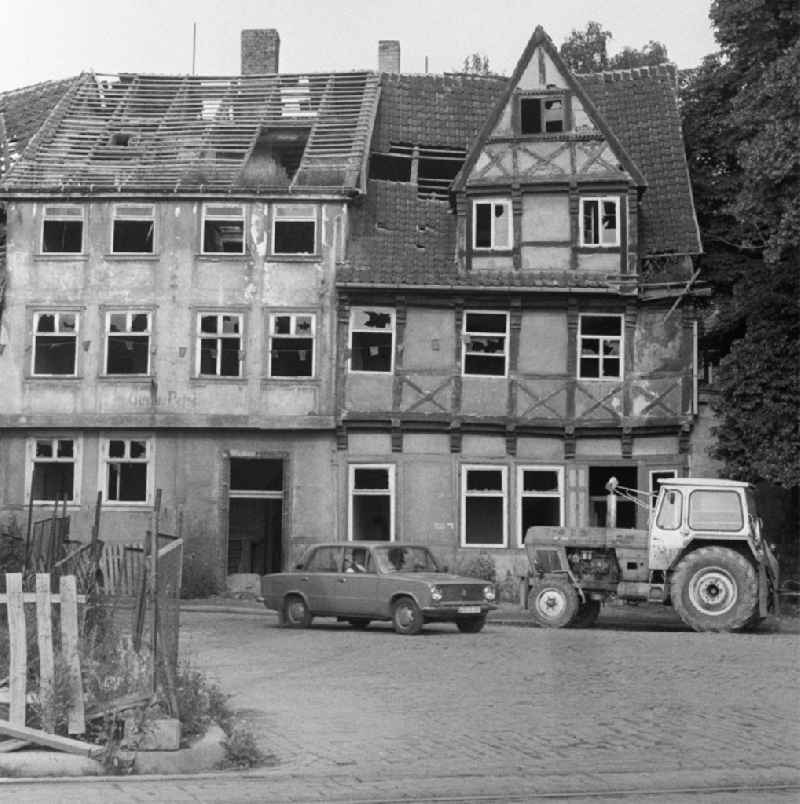 Rubble and ruins Rest of the facade and roof structure of the half-timbered house Bei den Spritzen in Halberstadt in the state Saxony-Anhalt on the territory of the former GDR, German Democratic Republic