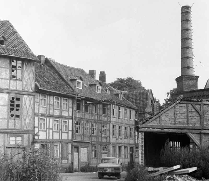 Rubble and ruins Rest of the facade and roof structure of the half-timbered house Bei den Spritzen in Halberstadt in the state Saxony-Anhalt on the territory of the former GDR, German Democratic Republic
