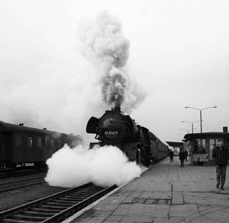 Arriving steam locomotive of the class 03 2242-
