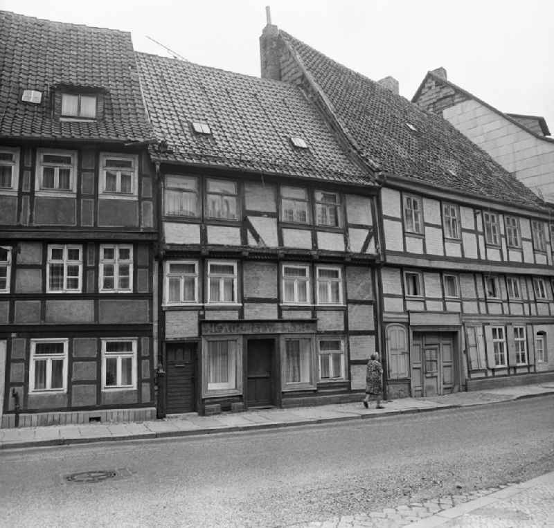 Half-timbered facade and building front an der Bakenstrasse in Halberstadt in the state Saxony-Anhalt on the territory of the former GDR, German Democratic Republic