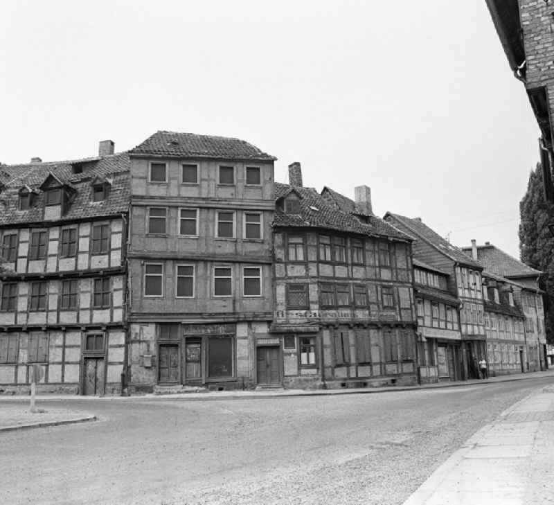 Rubble and ruins Rest of the facade and roof structure of the half-timbered house on Bakenstrasse in Halberstadt in the state Saxony-Anhalt on the territory of the former GDR, German Democratic Republic