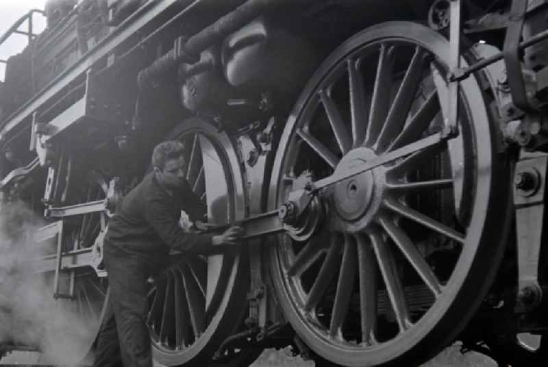Maintenance and repair work on the operation of steam locomotives of the Deutsche Reichsbahn of the construction series 23 in Halberstadt in the state Saxony-Anhalt on the territory of the former GDR, German Democratic Republic
