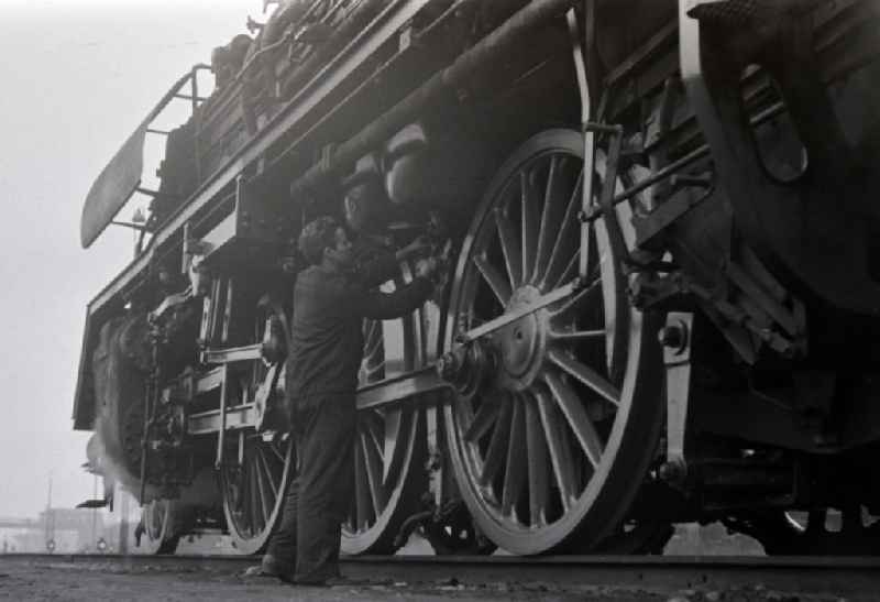 Maintenance and repair work on the operation of steam locomotives of the Deutsche Reichsbahn of the construction series 23 in Halberstadt in the state Saxony-Anhalt on the territory of the former GDR, German Democratic Republic