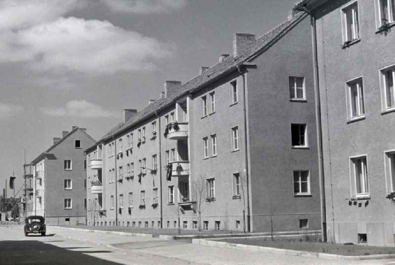 Facades and roofs of the residential building of the terraced house an der Birsmarckstrasse in Halberstadt in the state Saxony-Anhalt on the territory of the former GDR, German Democratic Republic