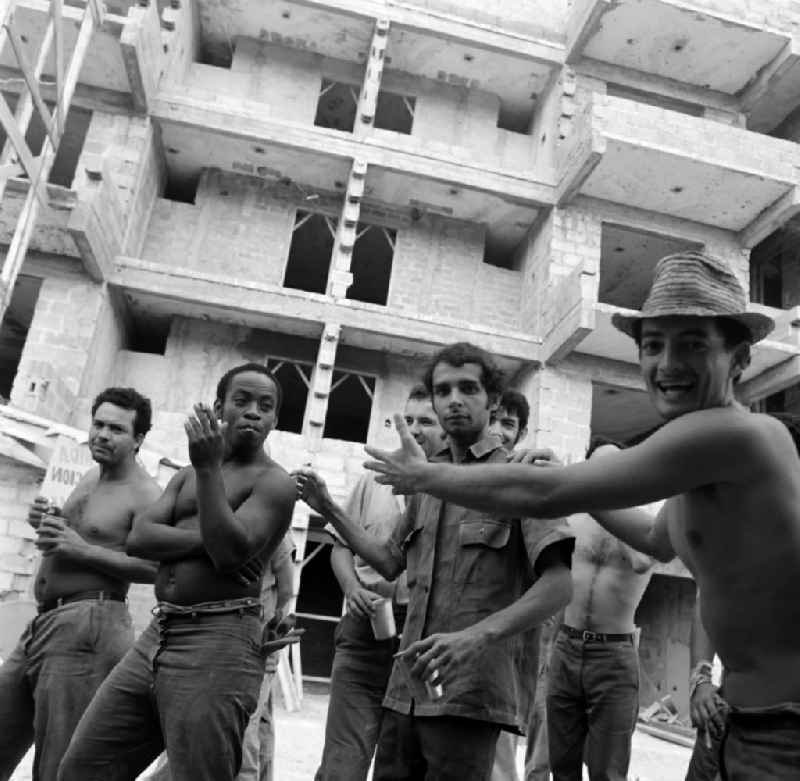 Construction workers on a building site in the district Alamar in La Habana in Kuba