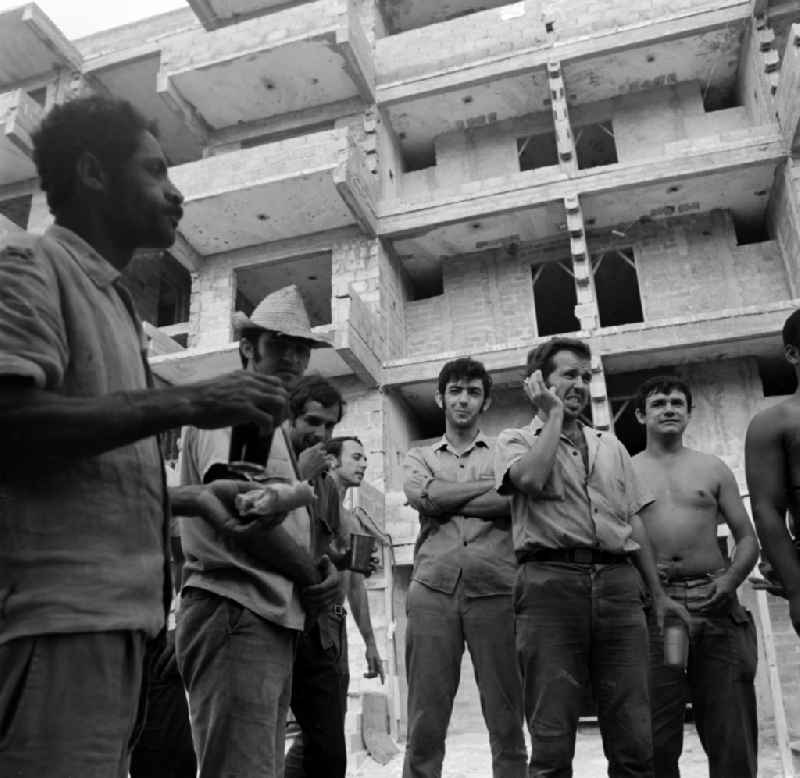 Construction workers on a building site in the district Alamar in La Habana in Kuba