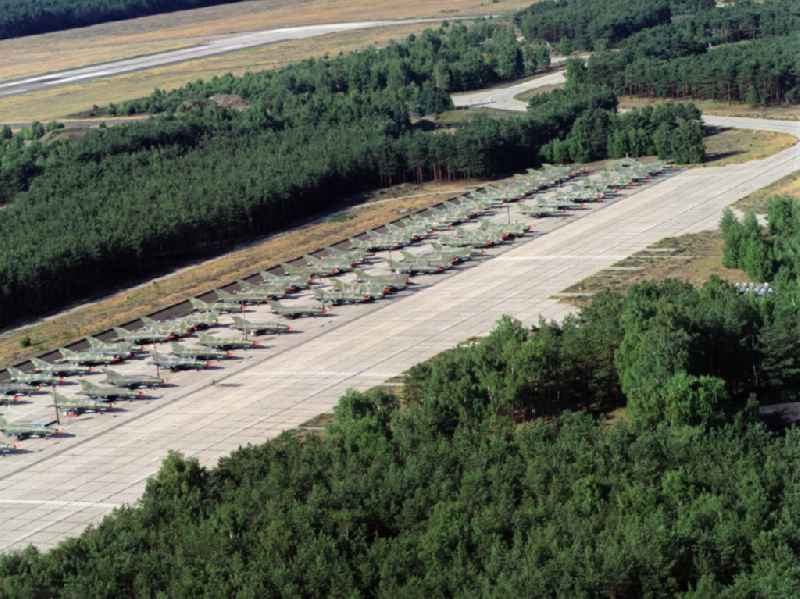 Military and combat technology of contracted Mig-21 fighter aircraft of the former LSK/LV air force of the NVA National People's Army intended for sale at the Drewitz airfield in Janschwalde in the state of Brandenburg in the territory of the former GDR, German Democratic Republic