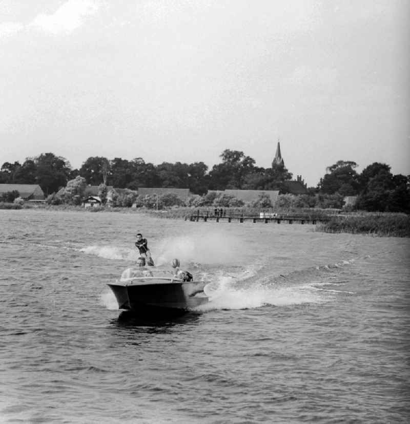 Motorboat with a water skier on the Kruepelsee in Kablow in today's federal state of Brandenburg