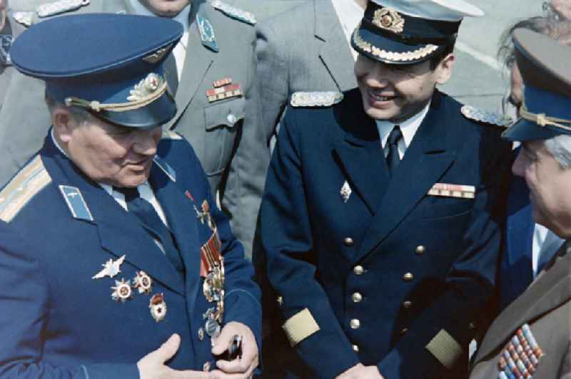 Meeting of army members of the NVA National People's Army with members of the GSSD group of the Soviet armed forces in Germany on the occasion of the visit of Colonel Mikhail Petrovich Dewjatajew with members of the LSK Air Force - Air Defense and the People's Navy stationed on the island at the memorial for the victims of the ' Army test site Peenemuende' in Karlshagen in the state of Mecklenburg-Western Pomerania on the territory of the former GDR, German Democratic Republic