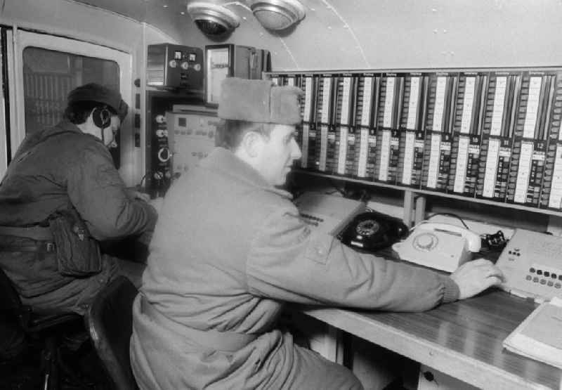 Radio operator and news engineer of the 2nd news regiment of the NVA in Wernsdorf in Koenigs Wusterhausen in the federal state Brandenburg in the area of the former GDR, German democratic republic