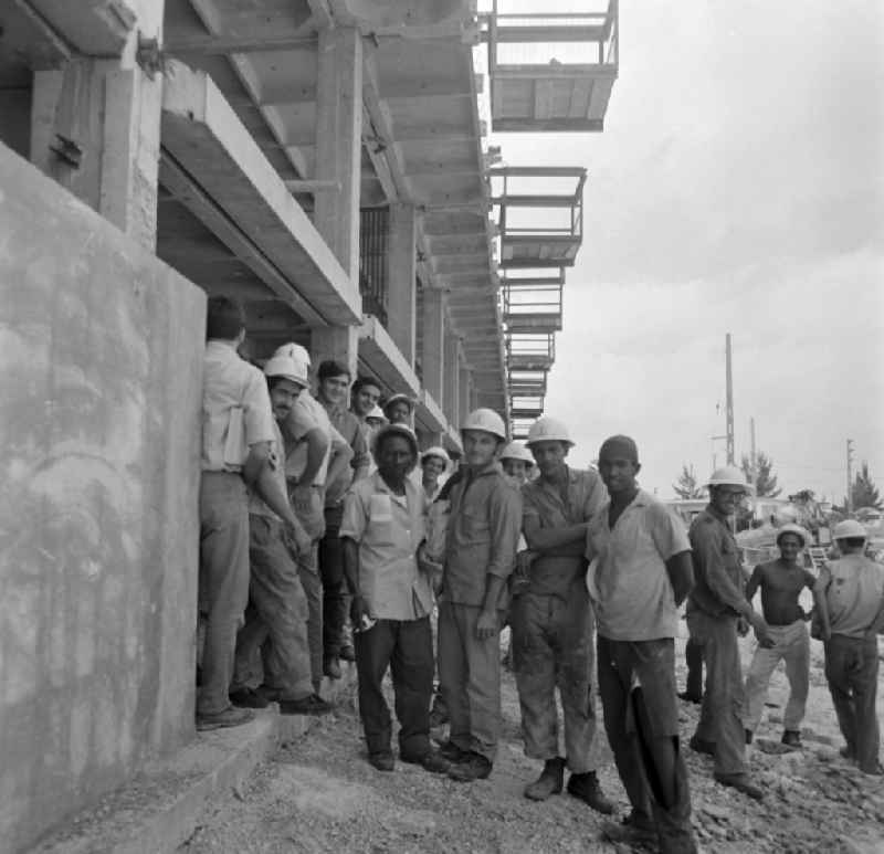 A group of steelworkers on a construction site in the district Alamar in Havanna in Cuba