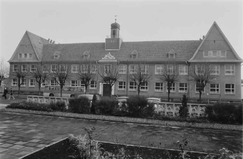 School building with tower - Secondary School OS Dr. Richard Sorge at Laubuscher Markt in the Upper Lusatian workers settlement Gartenstadt Erika in Laubusch in the state of Saxony on the territory of the former GDR, German Democratic Republic
