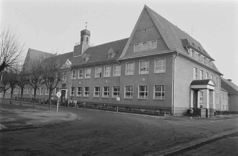 School building with tower - Secondary School OS Dr. Richard Sorge at Laubuscher Markt in the Upper Lusatian workers settlement Gartenstadt Erika in Laubusch in the state of Saxony on the territory of the former GDR, German Democratic Republic