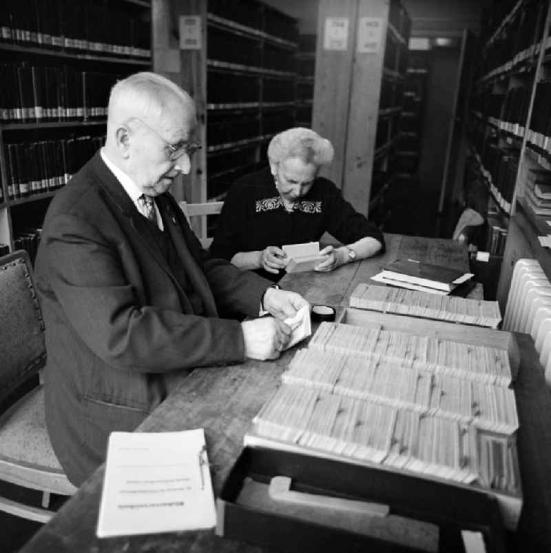 Two librarians in the Andersen-Nexoe home in Leipzig in the state Saxony on the territory of the former GDR, German Democratic Republic