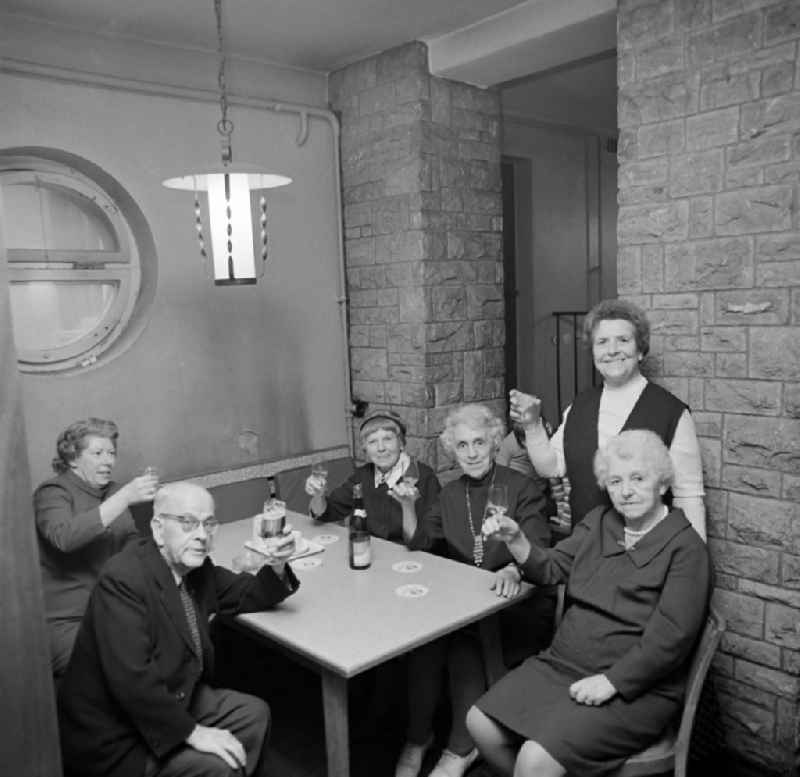 Senior citizens during a visit to a restaurant in Leipzig in the federal state of Saxony on the territory of the former GDR, German Democratic Republic