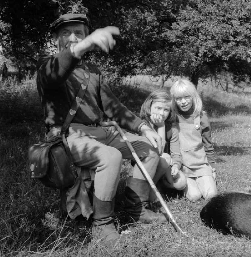 Shepherd with his two grandchildren in Lenzen(Elbe) in the federal state Brandenburg in the area of the former GDR, German democratic republic