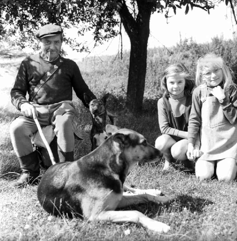Shepherd with his two grandchildren in Lenzen(Elbe) in the federal state Brandenburg in the area of the former GDR, German democratic republic