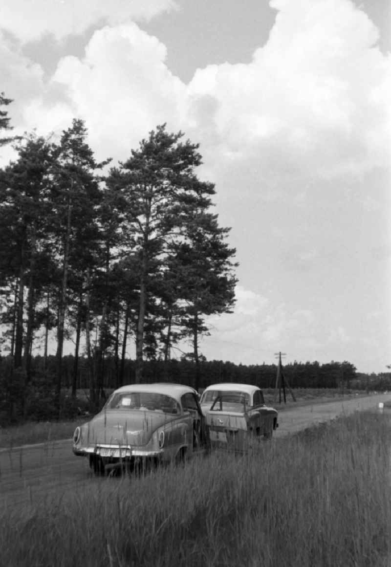 2 branded cars Wartburg 311 parked on a country road in Brandenburg