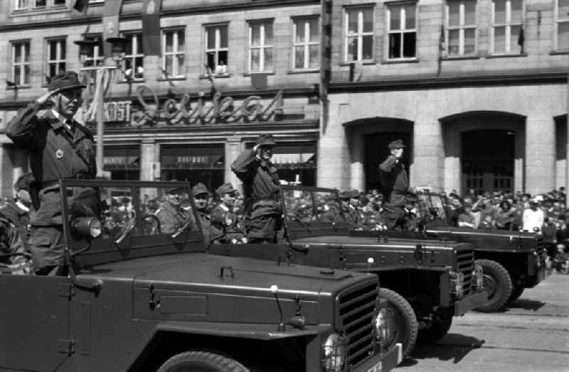 Uniformed and motorized units of the combat groups of the GDR at the parade on May 1 in Magdeburg. Here when passing with a military salute