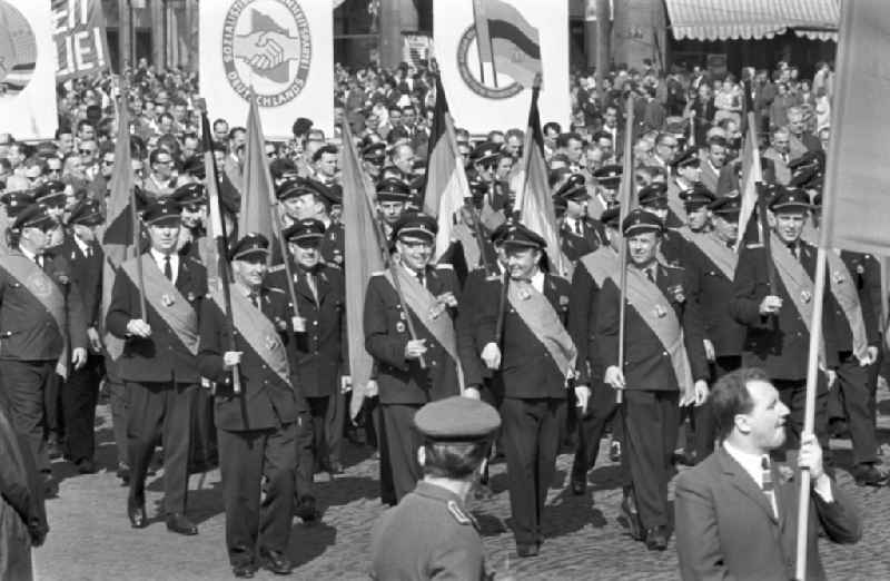 Employees of Deutsche Reichsbahn in uniform at the May 1 demonstration in Magdeburg. May Day is also known as May Day, Labor Day or achievements of the international labor movement