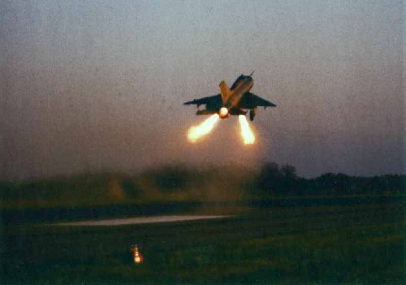 Takeoff of a MiG-21SPS with the tactical identification 73