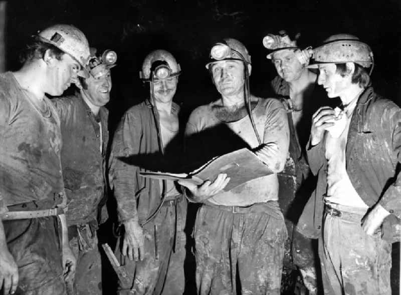 Miners underground in the mine and colliery for potash mining in Merkers-Kieselbach in the state Thuringia on the territory of the former GDR, German Democratic Republic