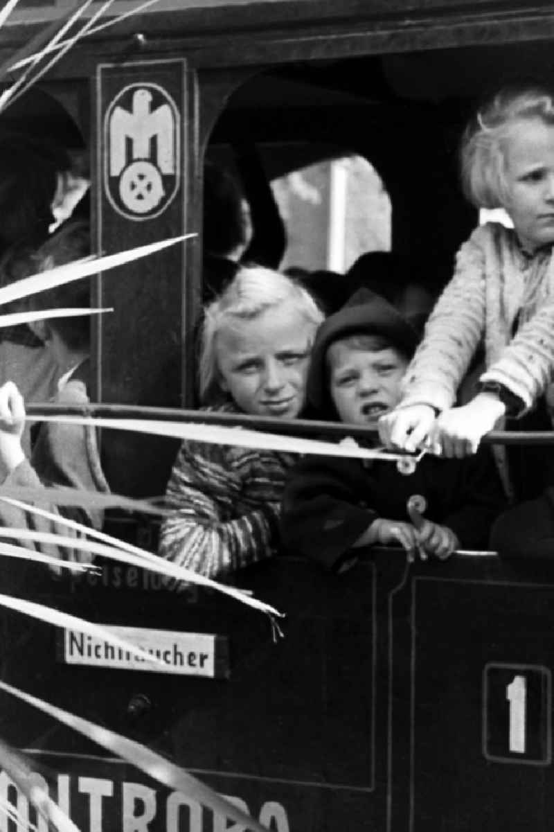 Children in a train compartment in Merseburg in the federal state Saxony-Anhalt in Germany