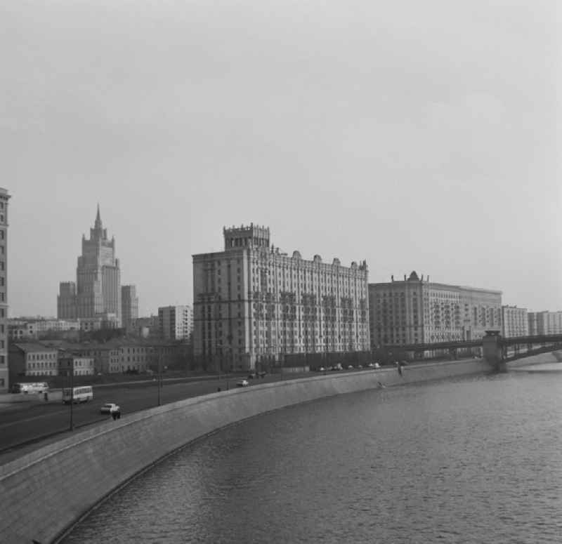 View over the Moskwa river on Stalin architecture at the Smolenskaya promenade in the district Zapadnyy administrativnyy okrug in Moscow in Russia