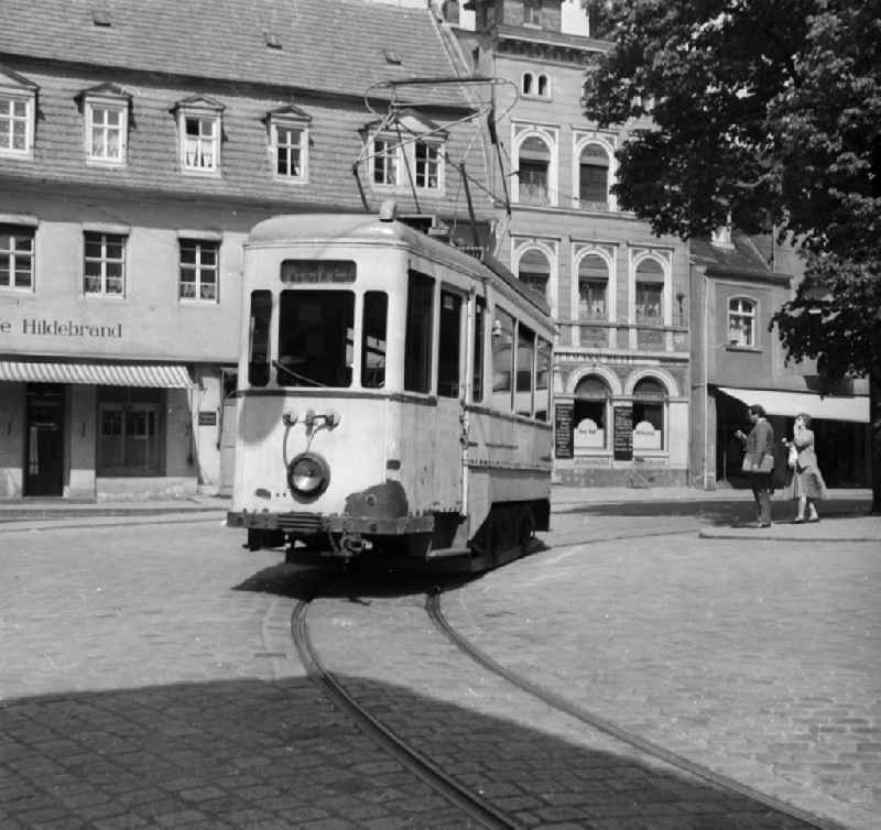 The Unstrutbahn / streetcar Naumburg on the marketplace in Naumburg in the federal state Saxony-Anhalt in the area of the former GDR, German democratic republic