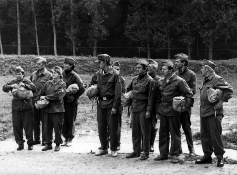 People at a civil defense exercise in Neuenhagen near Berlin, Brandenburg in the territory of the former GDR, German Democratic Republic
