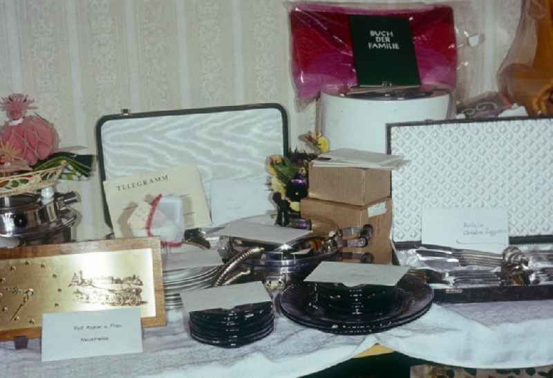 Table with classical presents to a wedding in Neustrelitz in the federal state Mecklenburg-West Pomerania in the area of the former GDR, German democratic republic