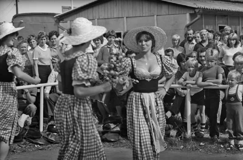 Residents and guests as participants in the events on the occasion of a village festival in Paaren, Brandenburg on the territory of the former GDR, German Democratic Republic