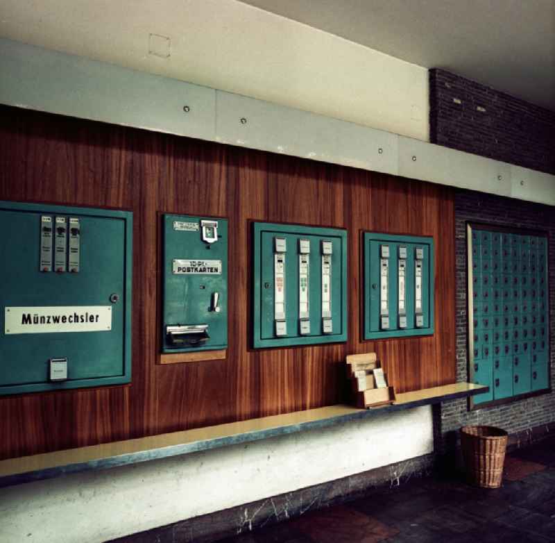 Modern coin changer, postcard machine, stamp machines and lockers at a post office in Potsdam on the territory of the former GDR, German Democratic Republic