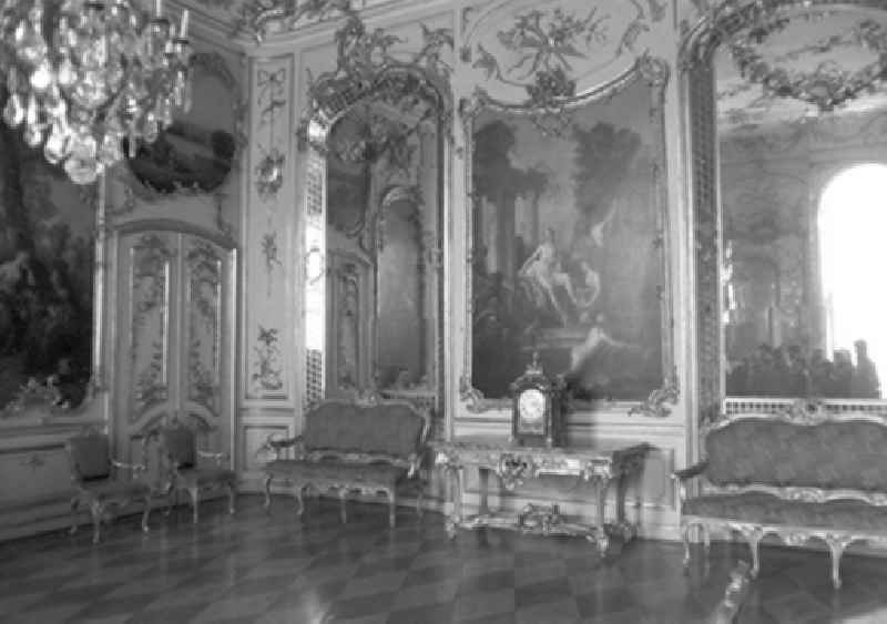 Visitors tour the concert room at Sanssouci Palace in Potsdam
