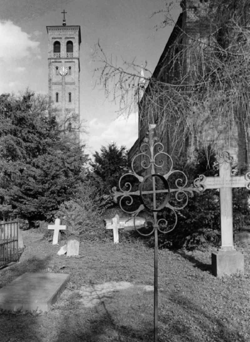 Historical part of the churchyard Bornstedter with Campanile and nave in the cemetery Bornstedt in Potsdam in East Germany