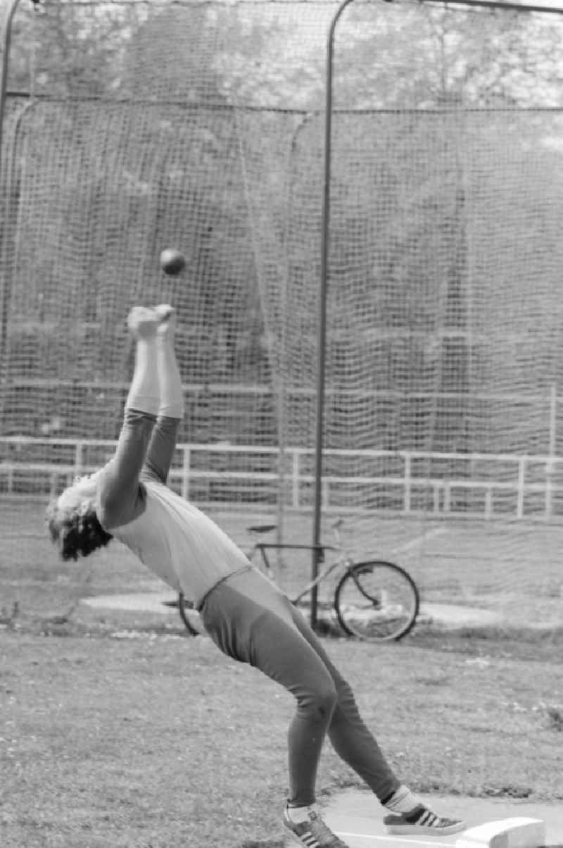 The javelin thrower / Athlete Uwe Hohn in Potsdam in Brandenburg on the territory of the former GDR, German Democratic Republic. Here in a pub, the hammer throw