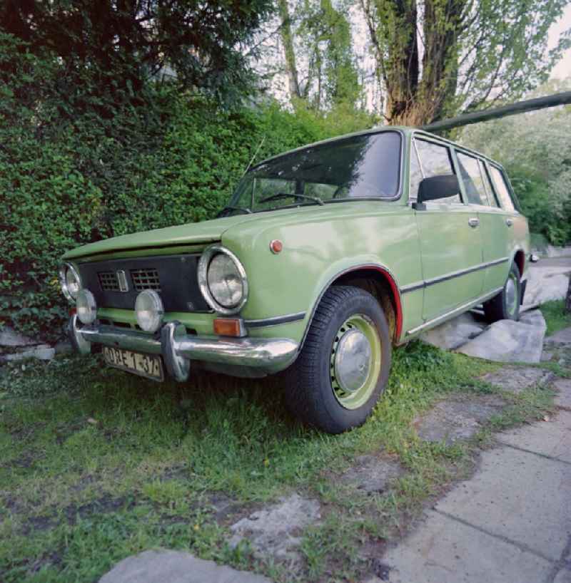 Green Cars - motor vehicles in a parking lot Lada 120