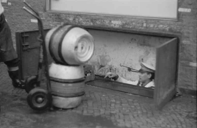 Delivery of everyday goodsof beer kegs on street Rudolf-Breitscheid-Strasse in Potsdam in the state Brandenburg on the territory of the former GDR, German Democratic Republic