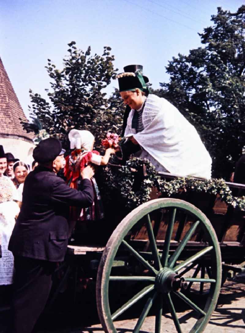 Wedding carriage and costumes and garments the Sorbian minority in Milkel in the state Saxony on the territory of the former GDR, German Democratic Republic
