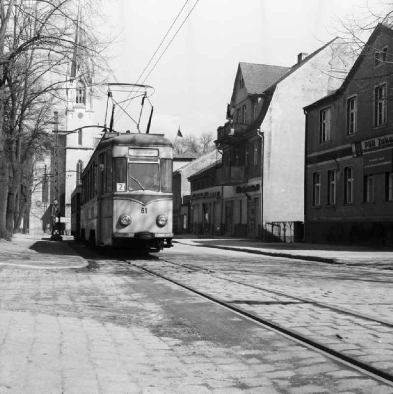 Old town of Ruedersdorf with the Kalkberger church and a tram near Berlin in the federal state Brandenburg on the territory of the former GDR, German Democratic Republic