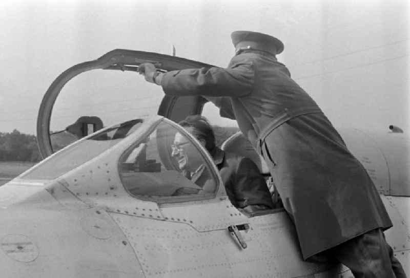 Portrait of Kurt Thieme (General Secretary of the Central Board of the Society for German-Soviet Friendship DSF) on the occasion of a visit to troops in a cockpit of a Mikoyan-Gurevich MiG-21 fighter aircraft of the GSSD Group of the Soviet Armed Forces in Germany in Ribnitz-Damgarten, Mecklenburg-Western Pomerania in the area the former GDR, German Democratic Republic