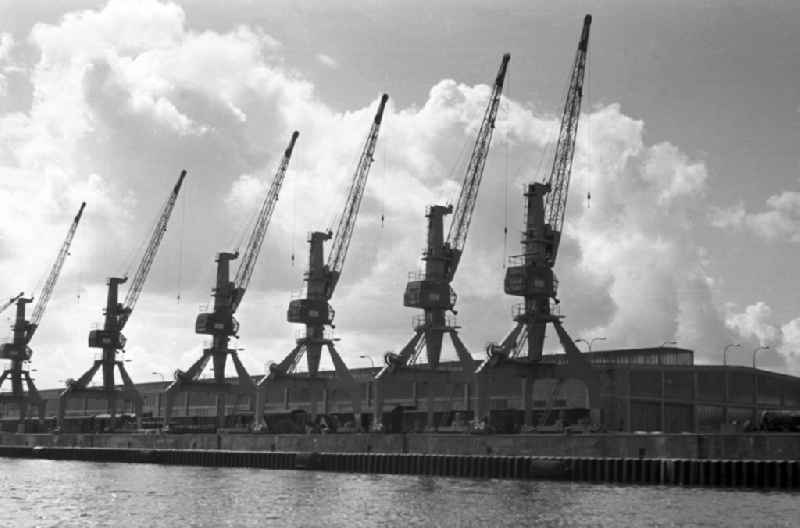 Loading cranes in the seaport of Rostock in Mecklenburg - Western Pomerania. By the division of Germany resulted in the need to build on the Baltic coast of East Germany a seaport. The new port was opened on 30 April 196