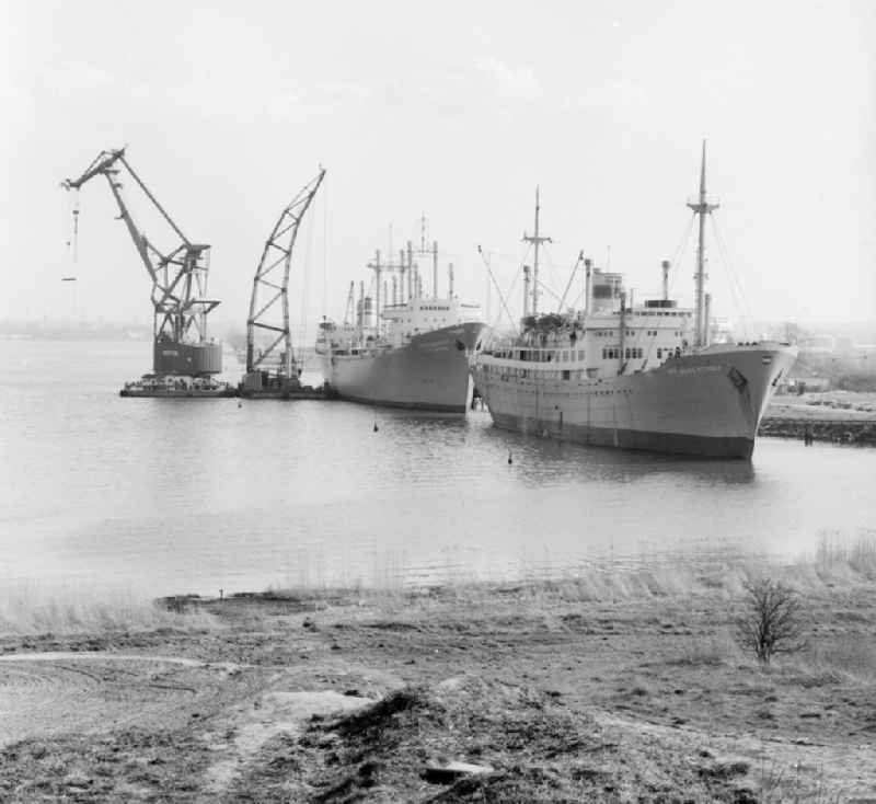 The traditional ship type ' Peace ' and the cargo and training ship of the VEB Deutsche Seereederei ' Georg Buechner ' are docked at the overseas port in Rostock in the federal state Mecklenburg-Vorpommern on the territory of the former GDR, German Democratic Republic