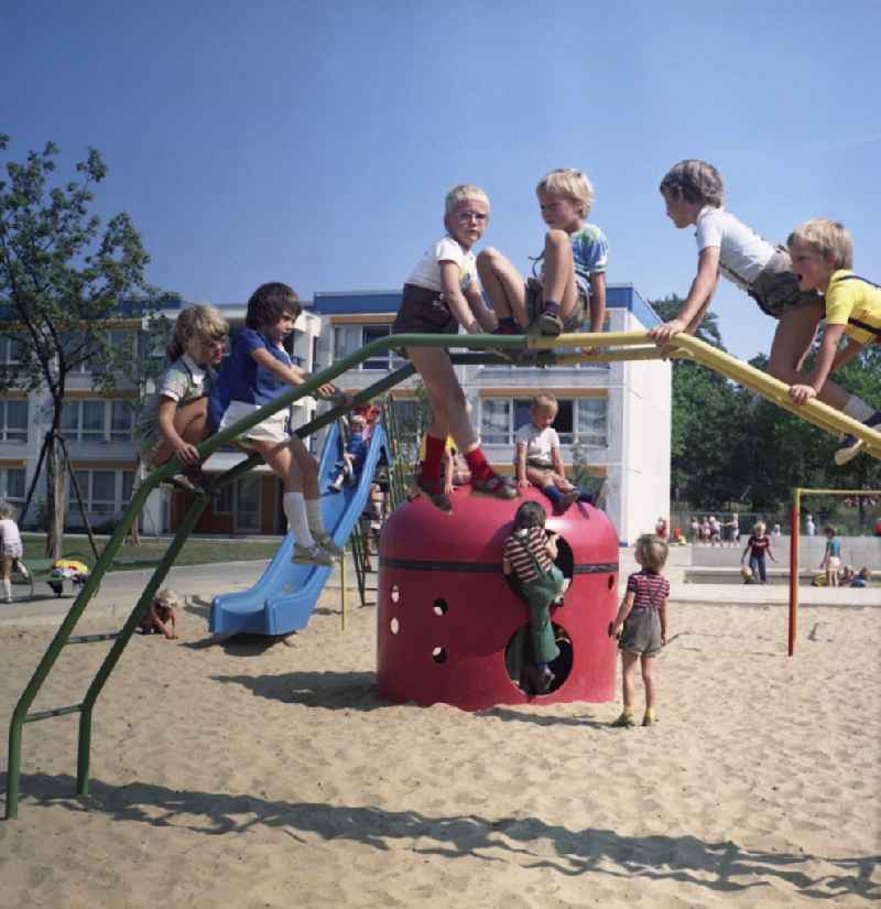 Fun and games for children and teenagers on a climbing arch - playground in Rostock in the state Mecklenburg-Western Pomerania on the territory of the former GDR, German Democratic Republic