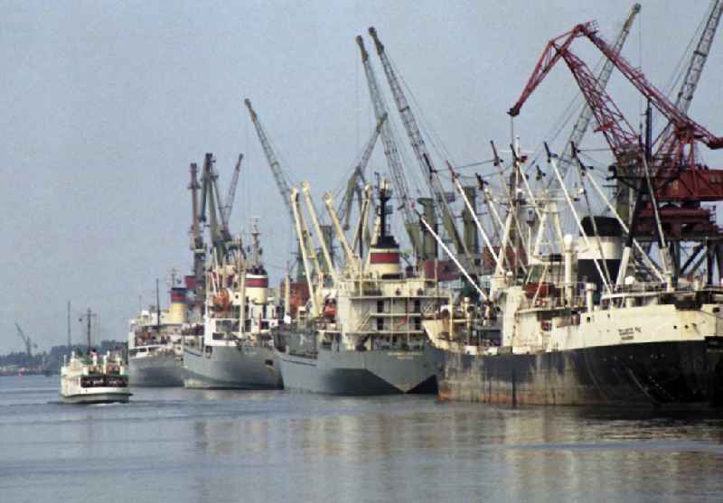 Loading, supply and unloading of ships the DSR in the overseas port at the quays in the port area in Rostock in the state Mecklenburg-Western Pomerania on the territory of the former GDR, German Democratic Republic