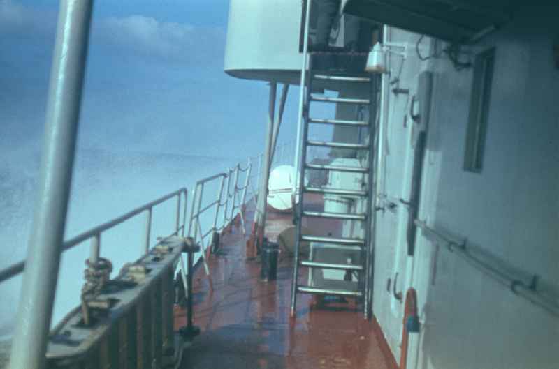 Side aisle and railing of a mining and clearing ship sailing on the Baltic Sea in Rostock, Mecklenburg-Western Pomerania in the territory of the former GDR, German Democratic Republic