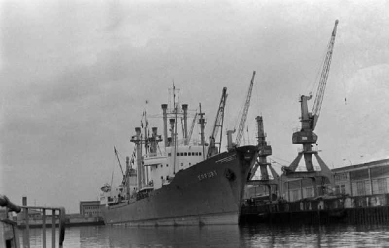 Loading, supply and unloading of the Danish ship 'Bella Dan' at the quays in the harbor area in Rostock, Mecklenburg-Western Pomerania on the territory of the former GDR, German Democratic Republic