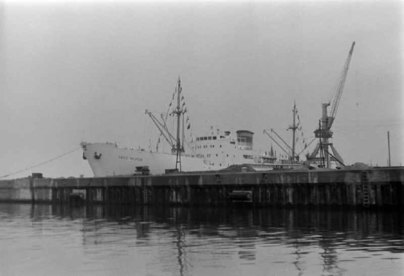 Loading, supply and unloading of the Danish ship 'Fritz Reuter' at the quays in the harbor area in Rostock, Mecklenburg-Western Pomerania on the territory of the former GDR, German Democratic Republic