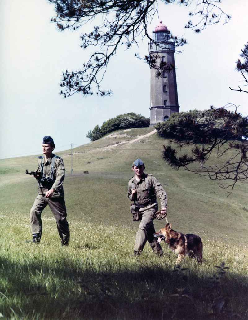Landside border control of the Baltic Sea coast by members of the border brigade Coast of East German border guards with headlight truck